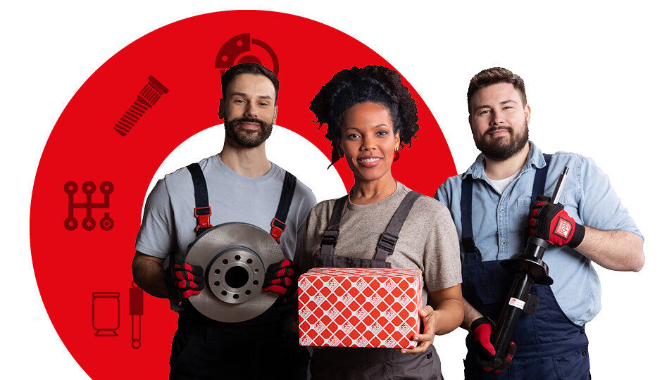 Three mechanics holding parts in front of a diagram showing icons of product groups
